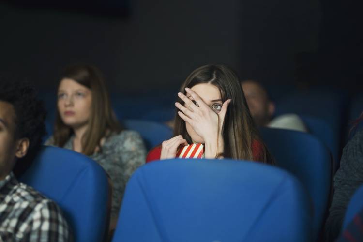 horror movie in movie theatre